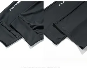 Détail du bas du pantalon de sport avec logo ATHLE blanc et tissu à séchage rapide