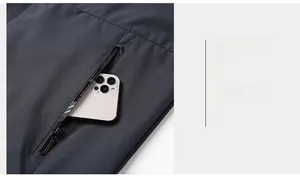 Detail of outdoor jacket side pocket with zipper closure and durable technical fabric