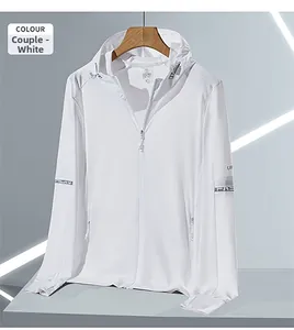 Detail of white hooded sun protection jacket featuring zipper pockets and lettered sleeve tape