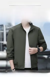 Detail of olive green casual jacket featuring a ribbed stand collar and full zipper closure