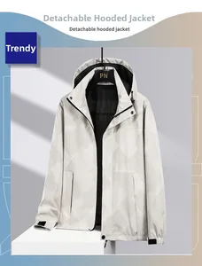 Detail of a white hooded jacket with geometric texture and detachable hood feature