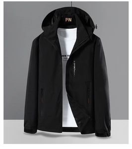Detail of black X-SPORT hooded outdoor jacket with adjustable drawstring and orange zipper accents