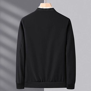 Men's minimalist black business casual jacket with ribbed collar shown from the back view
