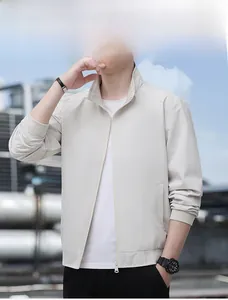 Detailed view of light beige men's jacket with stand collar and ribbed hem finish