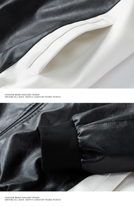 Detailed close-up of the ribbed cuffs and side pockets on a men's PU leather biker jacket