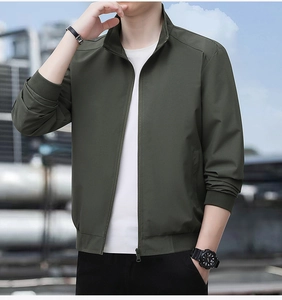 Close-up of military green casual jacket showing stand collar and high-quality zipper detail