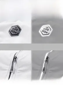 Detail of UPF 50+ logo and reflective zipper on breathable sun protection fabric