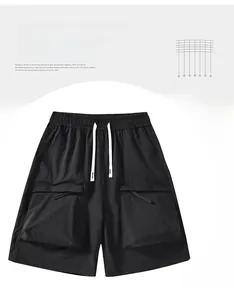 Detail view of black cargo shorts featuring elastic drawstring waist and large 3D pockets