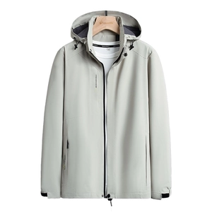 Light gray hooded functional windbreaker with fashionwear lettering on a wooden hanger