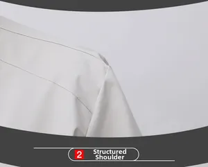 Detailed close-up of structured shoulder seams on a white casual jacket for men