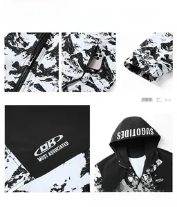 Detail view of windproof hooded jacket showing zipper, logo embroidery and elastic cuffs