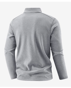 Back view of a grey half-zip fleece jacket showing minimalist stand-collar and soft texture