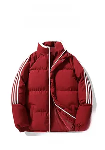 Detail view of the red padded jacket showing white side stripes and elastic cuffs