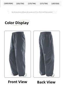 Vue détaillée des poignets à cordon réglable sur un pantalon cargo gris foncé