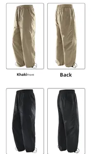 Vue détaillée du pantalon cargo kaki et noir avec ourlets ajustables et taille élastique