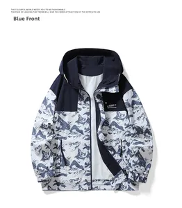 Detail of navy blue windbreaker featuring white mountain print and adjustable hood