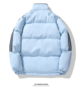 Detail of light blue winter jacket back with three black stripes and elastic cuffs