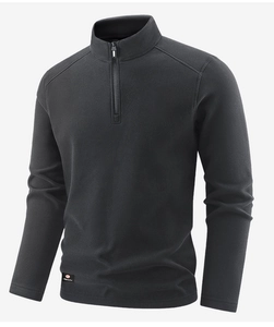Detail of the high-quality 1/4 zipper collar and warm fleece texture on a sports jacket