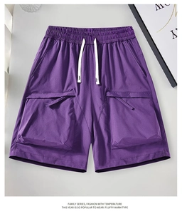 Close-up of dark purple cargo shorts featuring elastic drawstring waist and large side pockets