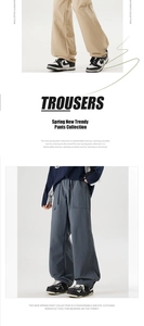 Détail de l'ourlet réglable par cordon sur les pantalons cargo amples kaki et gris foncé