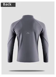 Macro detail of the back view of a grey athletic long sleeve shirt with a small V-shaped logo