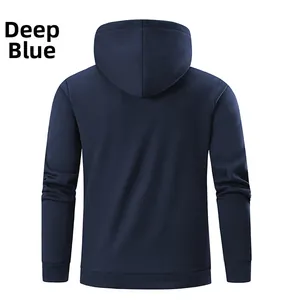Detail view of the back of a dark blue fleece-lined hoodie with ribbed cuffs and hem