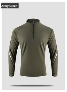 Close-up of military green athletic sweatshirt with reflective sleeve details and half-zip