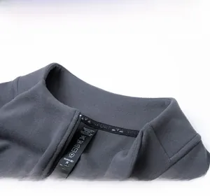 Detail of half-zip fleece collar with durable stitching and premium inner neck tape