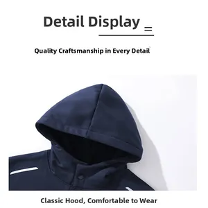 Detail view of navy hoodie featuring collar snap button and white shoulder stripes
