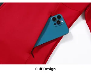Detail of red sports jacket featuring a secure side pocket with a hidden zipper and phone