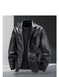 Detail showing high-quality black faux leather texture and notch lapel of the jacket