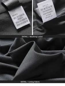 Macro view of breathable dark grey mesh fabric and detailed care labels for outdoor jacket