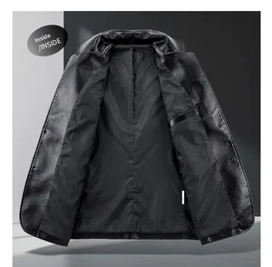 Detail view of the black leather jacket's interior lining, inner pocket, and stitching