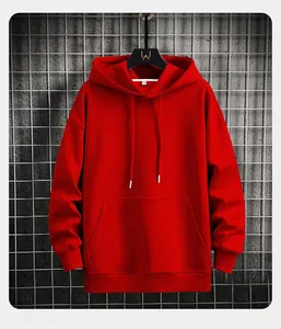 Detail of red hoodie featuring a drawstring hood, kangaroo pocket, and ribbed cuffs