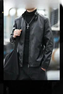 Detail of men's black faux leather biker jacket with stand collar and metal zipper closure