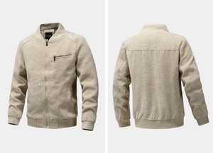 Detail of light khaki textured jacket showing front zippers and ribbed baseball collar
