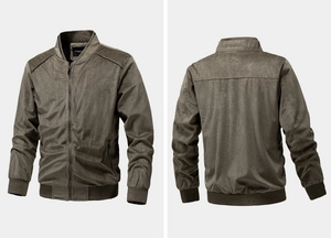 Macro detail of olive green bomber jacket showing corduroy texture and ribbed cuffs