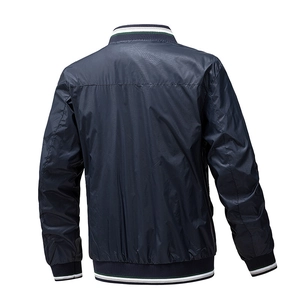 Back view of a navy blue lightweight bomber jacket for men with striped ribbed trims