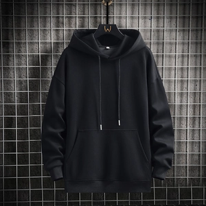 Men's black casual hoodie with kangaroo pocket and drawstring on industrial background