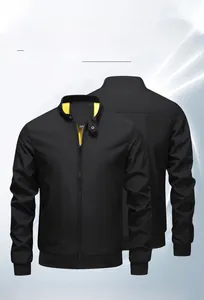 Close-up of lightweight black bomber jacket featuring high-contrast yellow lining