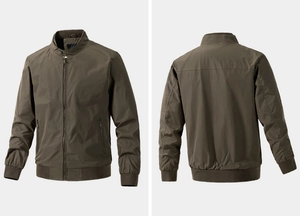Detail of olive green bomber jacket showing ribbed collar, cuffs and secure zipper pockets
