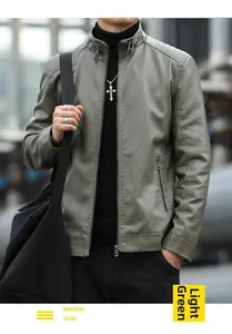 Detail of light green faux leather jacket for men featuring a stand collar and zip pockets
