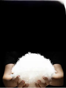 Detailed macro shot of premium white duck down filling with high loft and soft texture