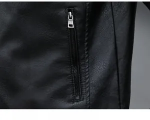 Detail of a black leather motorcycle jacket showing high-quality lychee grain and metal zipper