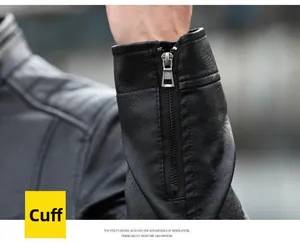 Detail of premium black leather jacket cuff featuring adjustable silver metal zipper