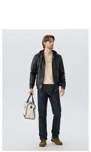 Full view of men black PU hooded jacket styled with dark denim jeans and brown leather boots