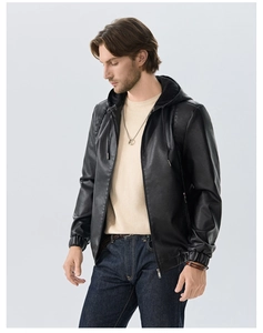 Detail view of men's matte black hooded PU leather jacket with drawstring and zip closure