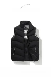Detail of men's black vest featuring a heat-reflective silver honeycomb lining and zipper