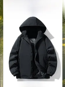 Detail view of graphene honeycomb heating lining inside black hooded winter parka