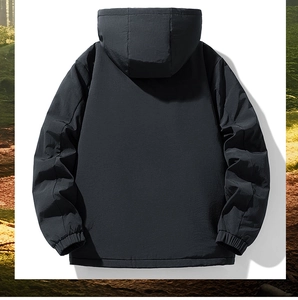 Rear view of black hooded jacket with windproof fabric and elastic cuffs in outdoor style